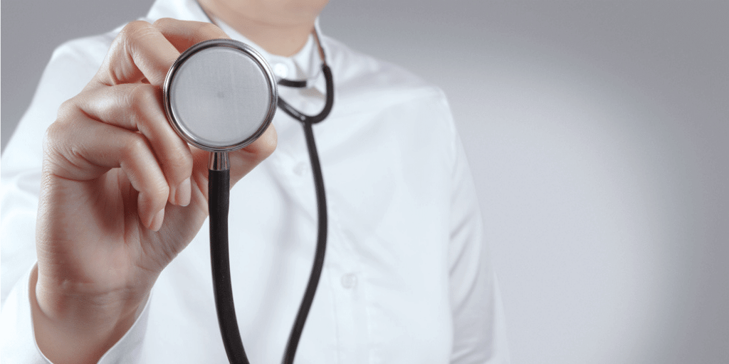 stethoscope in doctor's hand suggesting searching for a high paying medical job